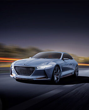 The Genesis New York concept car is speeding on the road.
