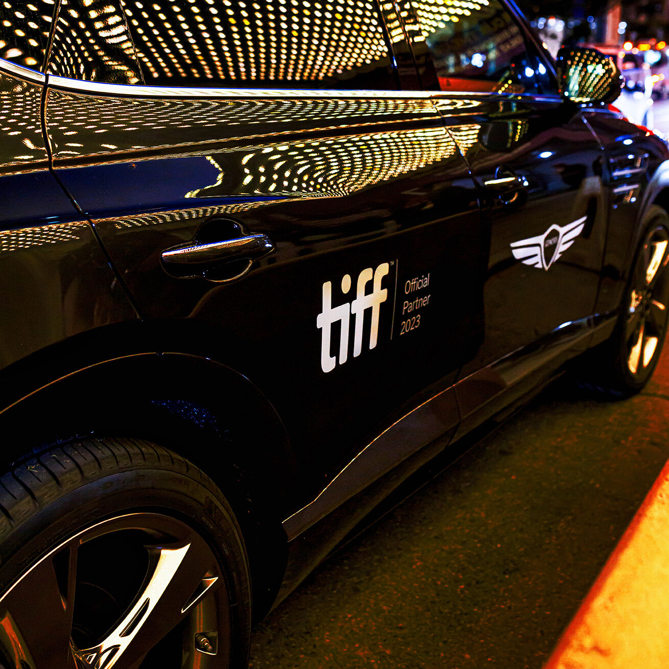 Closeup of Genesis GV80 with TIFF decal 
