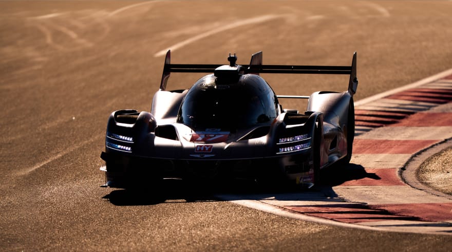 Front view image of the GMR-001 hypercar cornering on a circuit
