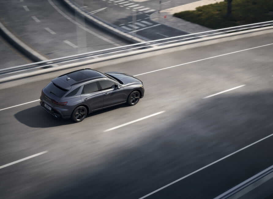 Side exterior view of Genesis GV70 Sport.