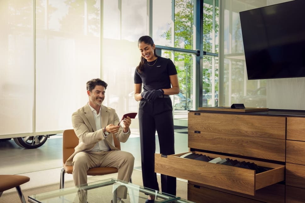 Man customizes Genesis vehicle purchase at Genesis Distributor