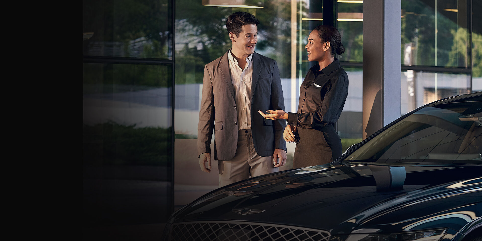 GXM interacting with a customer in Genesis Showroom