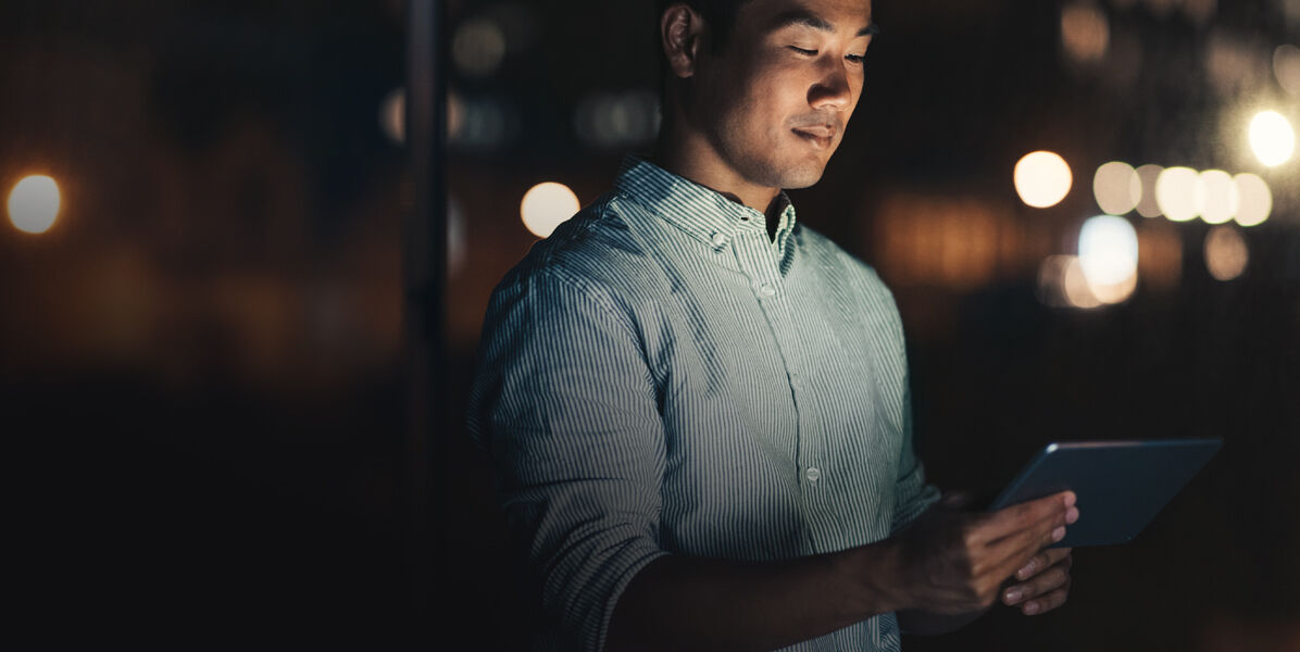 Genesis Connected Services owner with tablet