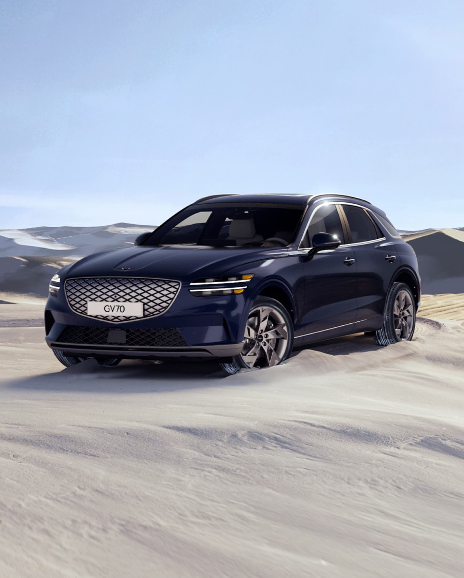 The Electrified GV70 drives in the desert. 