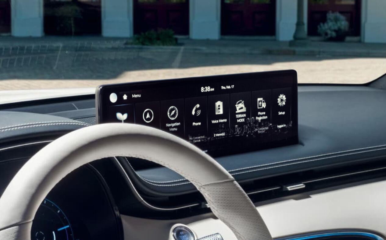 The 14.5-Inch Genesis Infotainment is seen close up from inside the car.