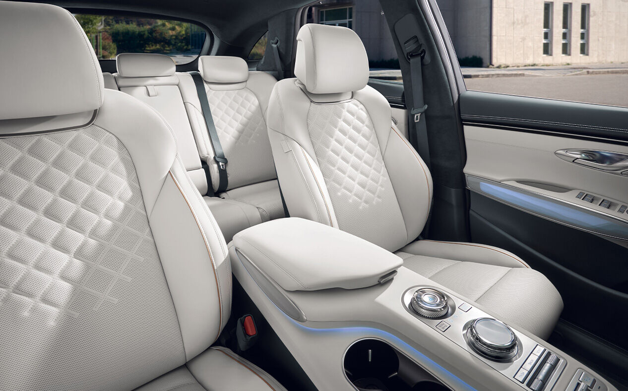 The Driver’s Ergo Motion Seat is seen within the Ocean Wave Blue & Glacier White colored interior