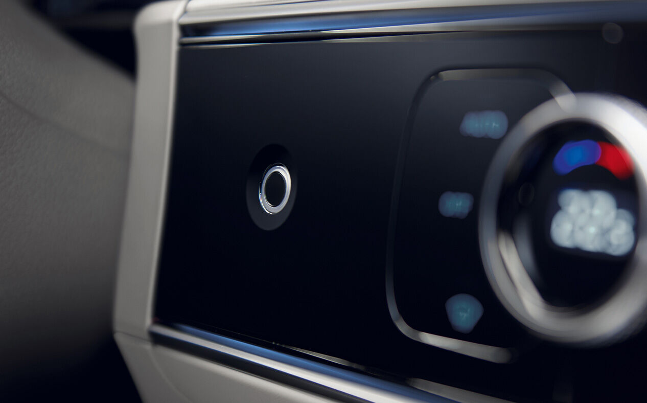 A close-up of the round shaped Fingerprint Authentication System.