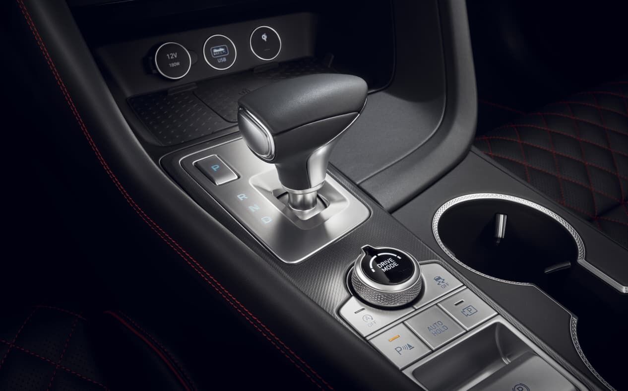 Close-up of the Genesis G70 8-speed automatic transmission and shift-by-wire