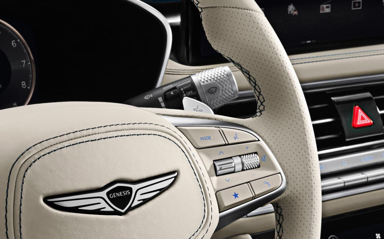 Close-up of paddles shifters on steering wheel
