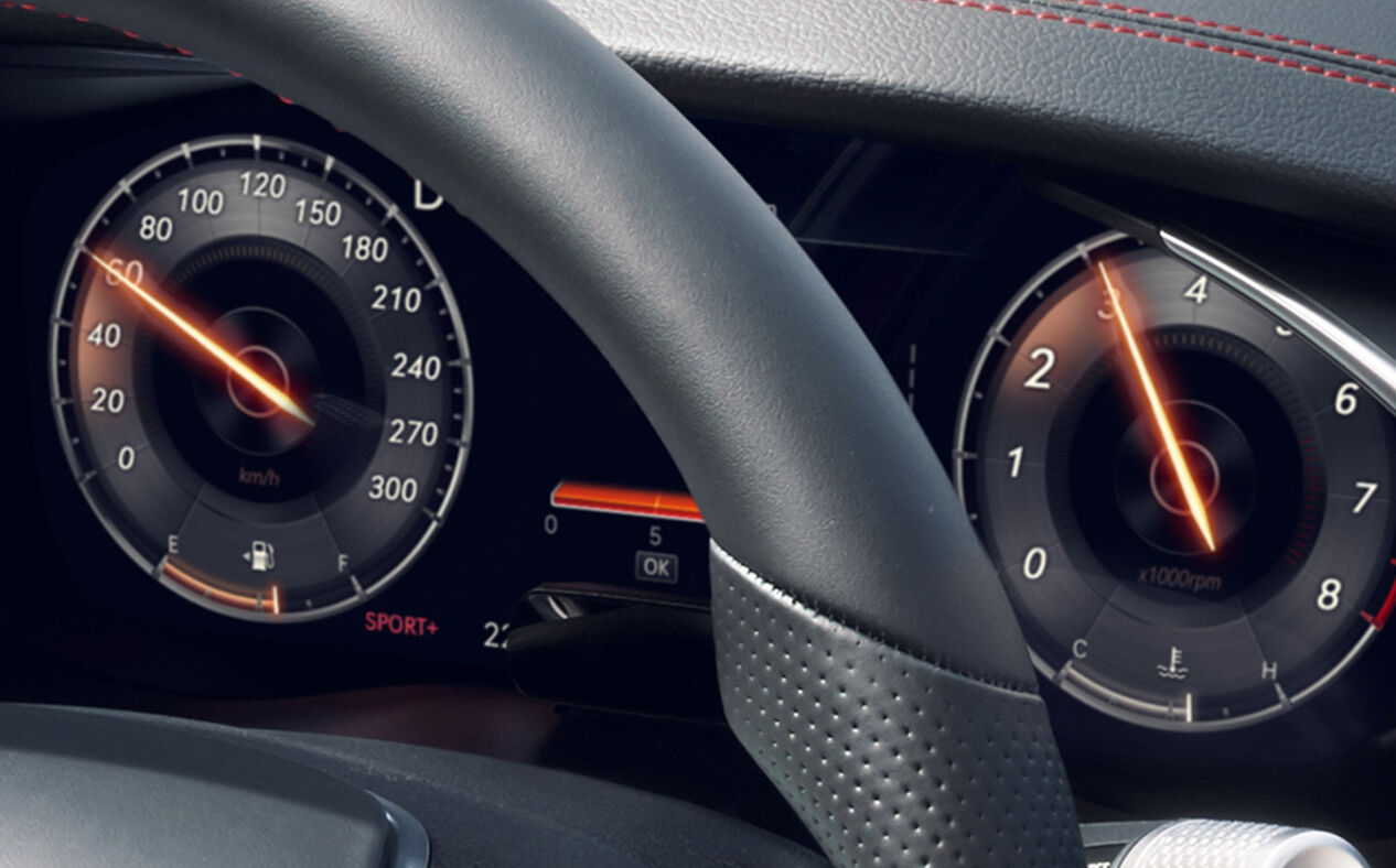 Close-up of G70 instrument cluster with Sport+ mode
