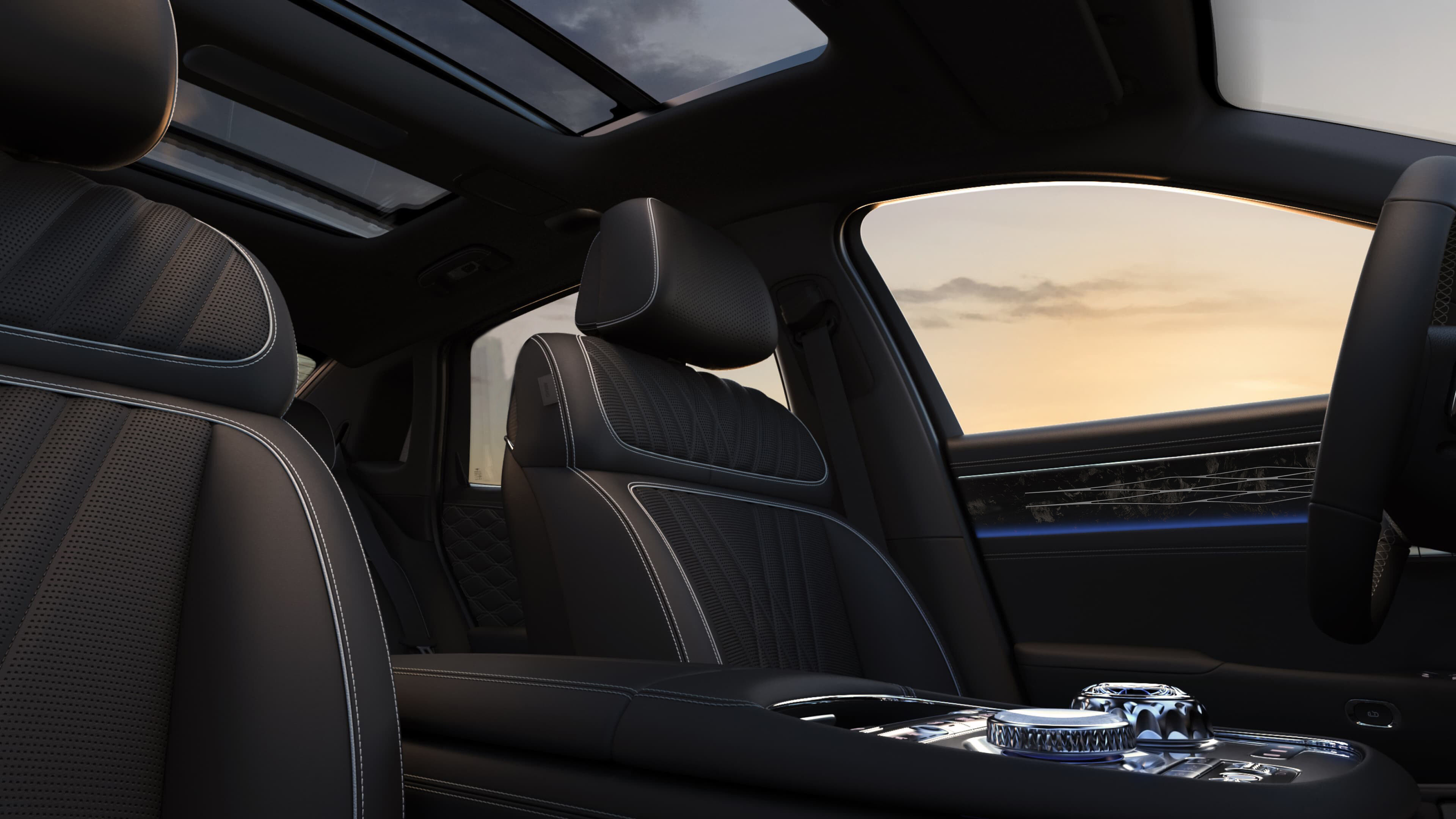 Blue mood lighting shines on the passenger side of G90 with Obsidian Black interior.