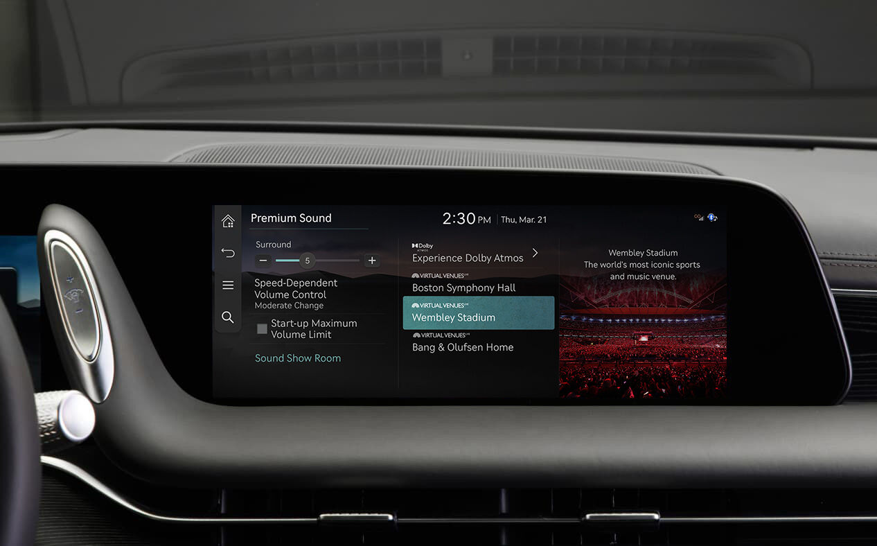 The premium sound selection screen is seen on the infotainment display.
