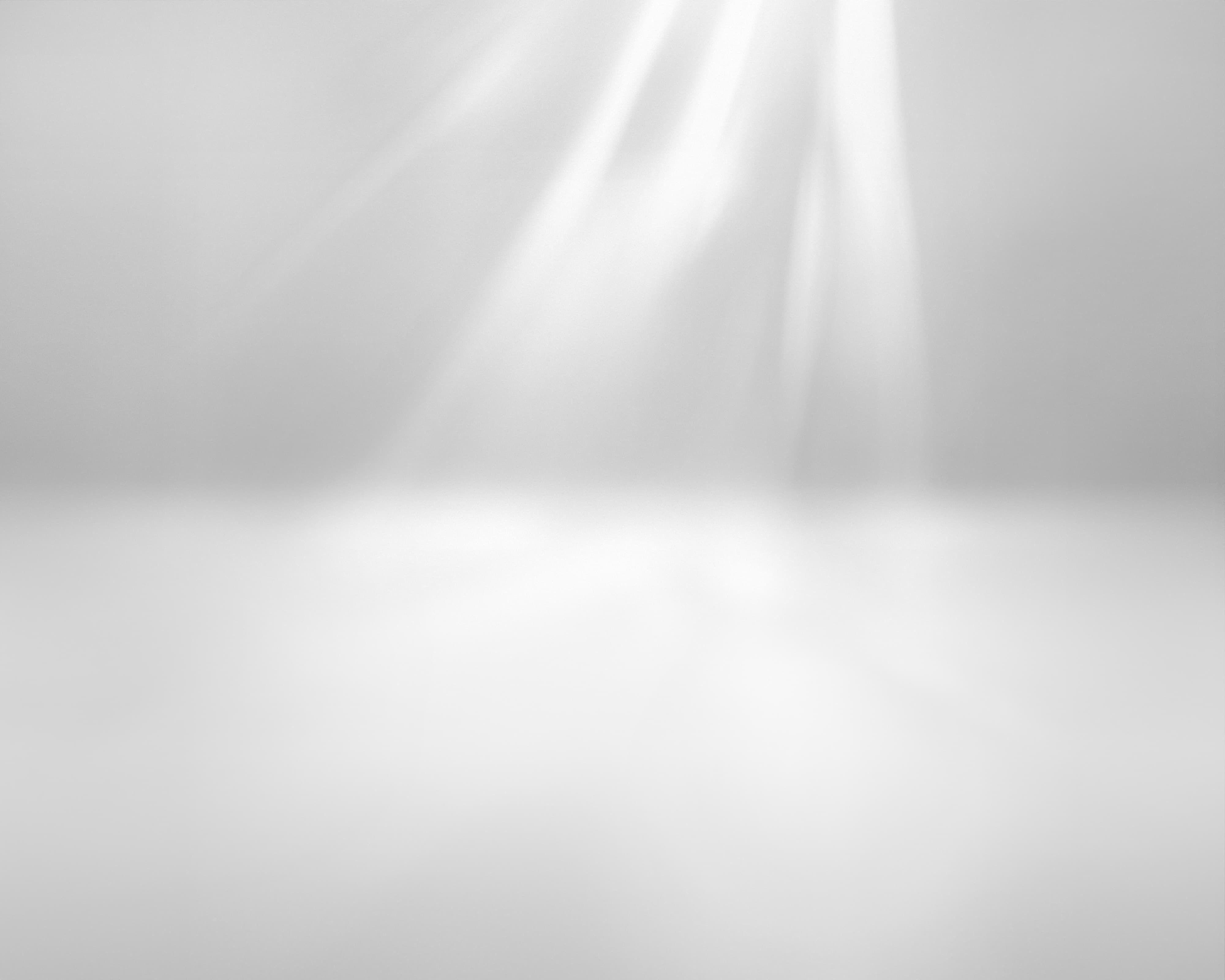 A GV60 in Savile Silver rotates against a studio background.