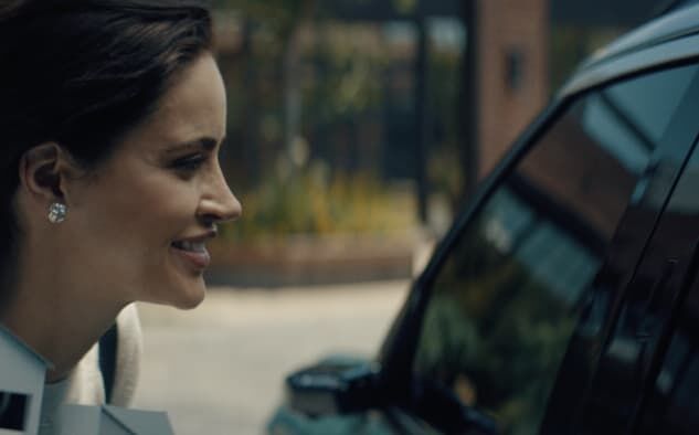 A driver unlocks the door using facial recognition.