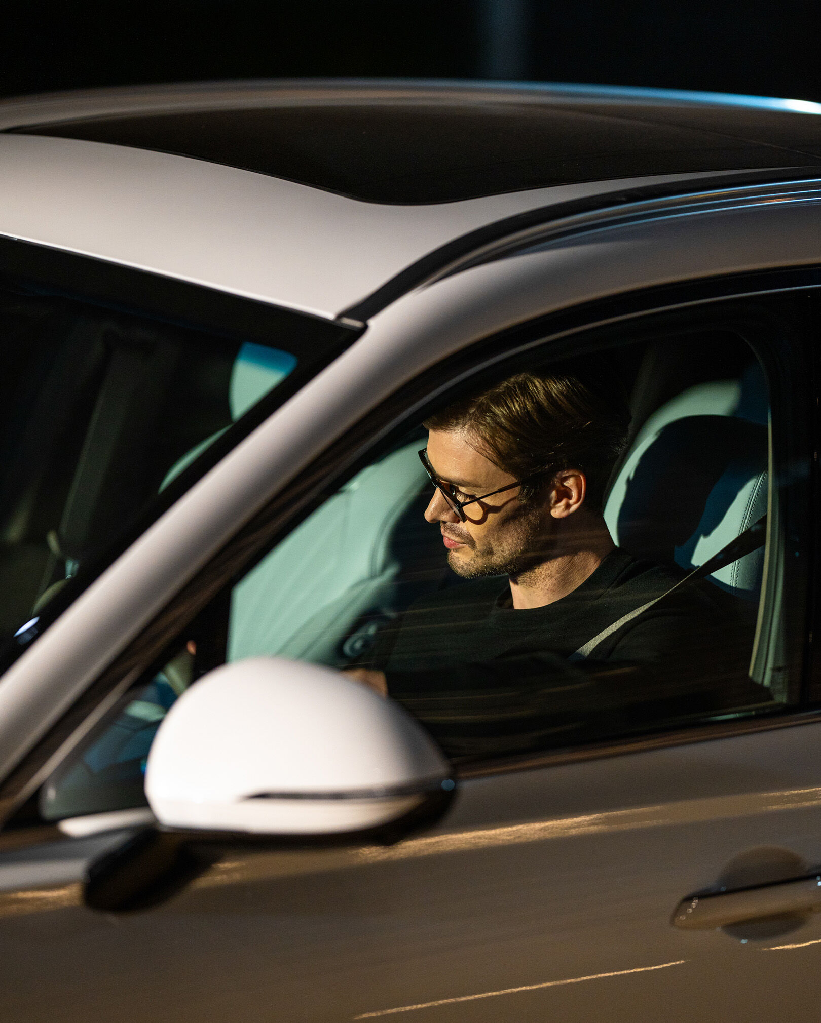 You can see a more enlarged view of the driver sitting in the driver's seat.