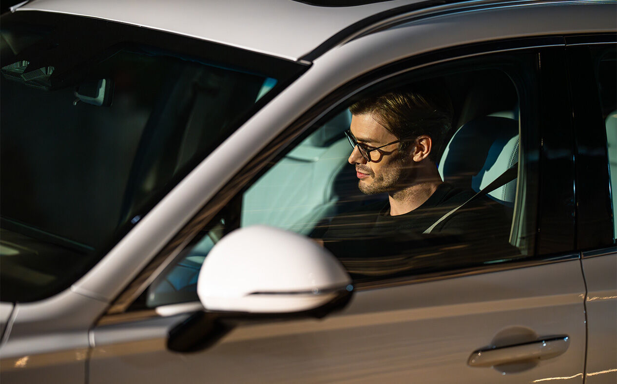You can see the driver sitting in the driver's seat.