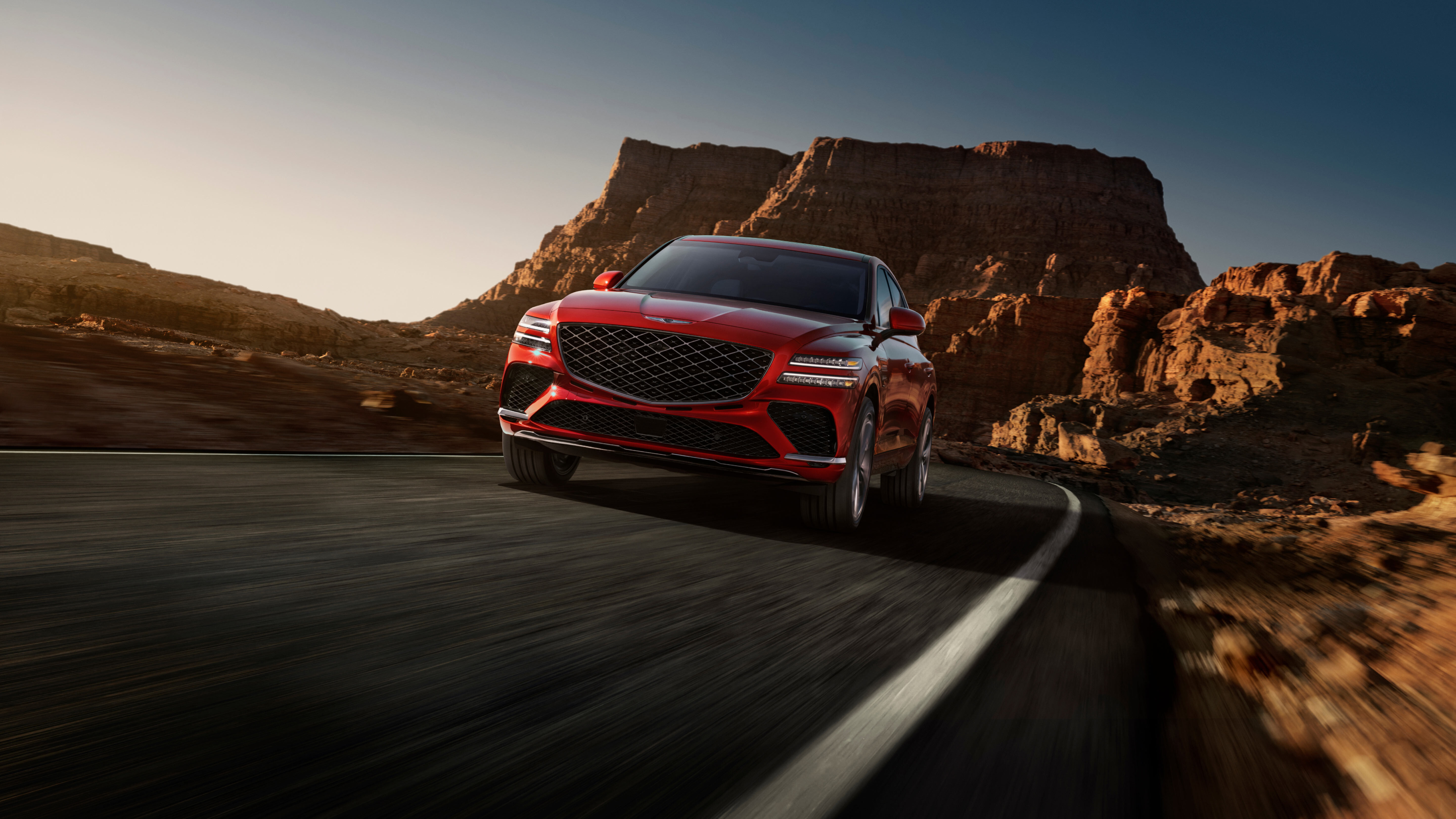 Vue de la face avant d'un GV80 Coupé en Rouge Mauna.