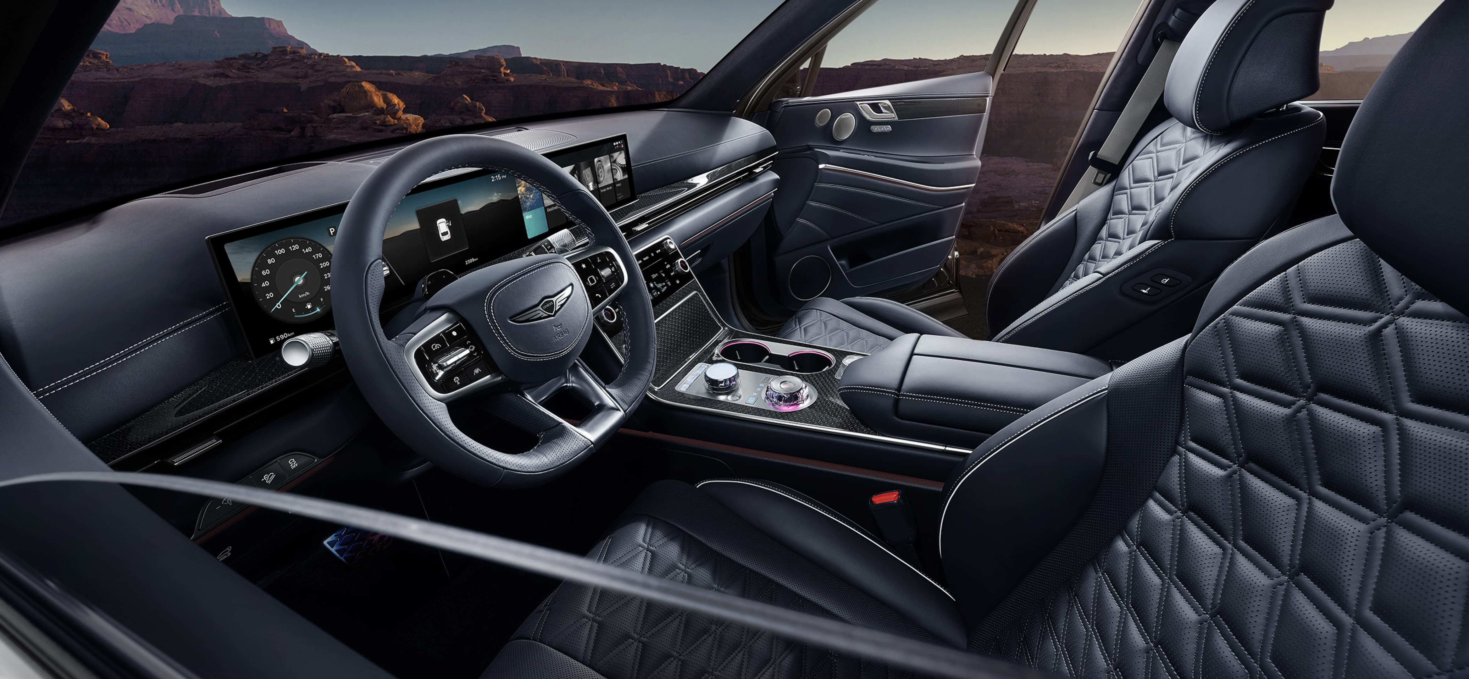 L'intérieur Bleu ultramarine monochrome du GV80 Coupé, montré depuis le volant jusqu'aux sièges avant.