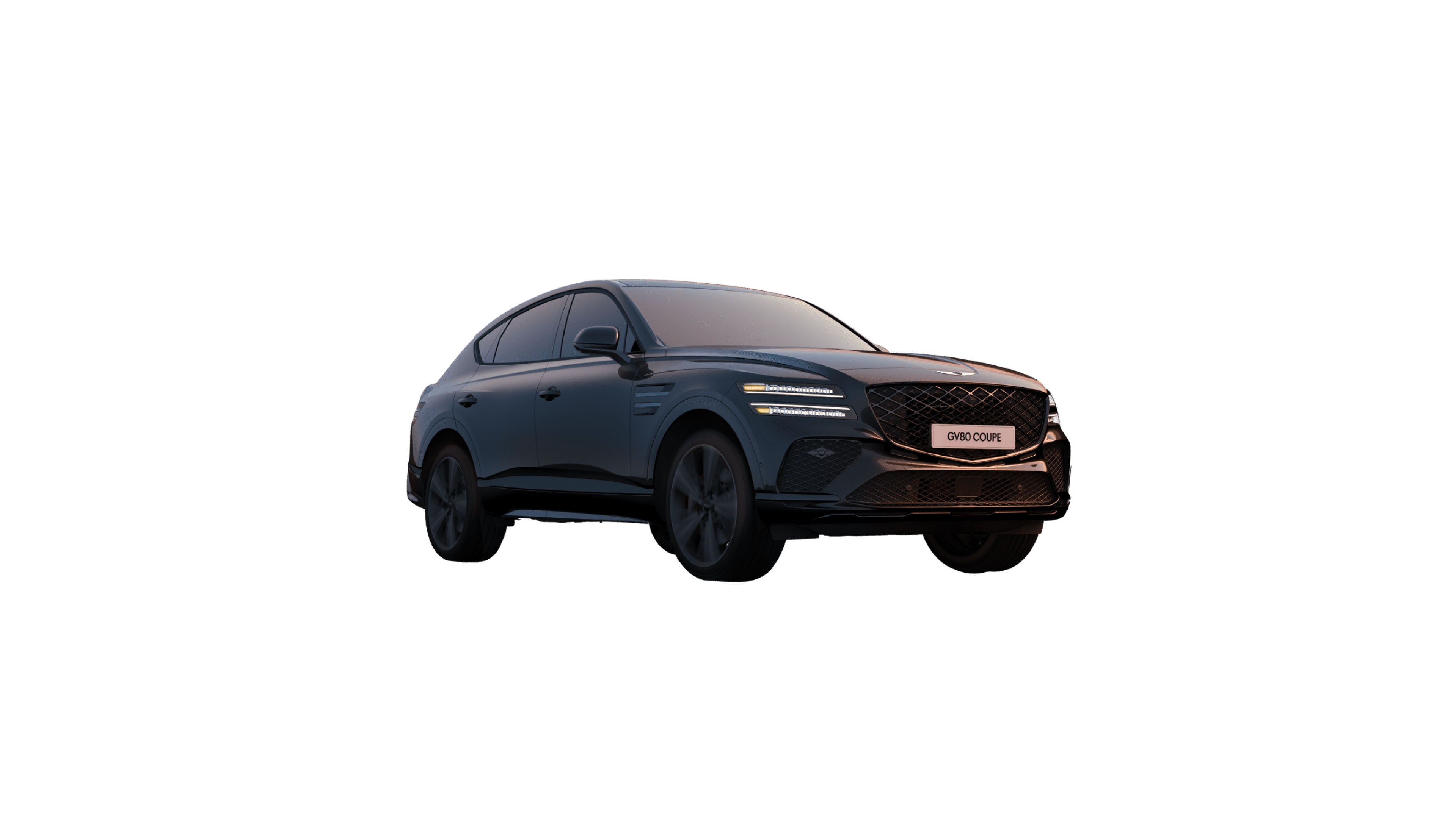 Un GV80 Coupé en Noir Vik roulant sur une plage sablonneuse.