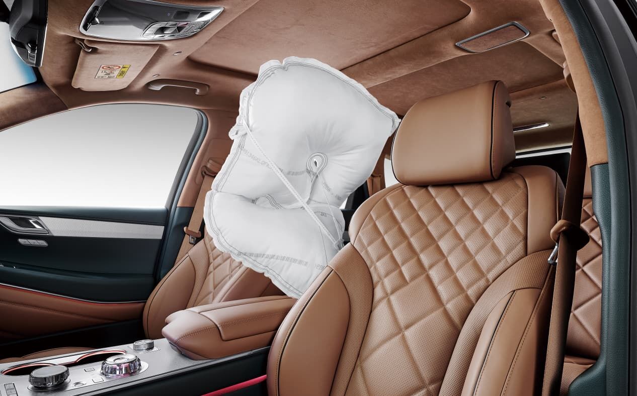 Vue d'un coussin gonflable entre le siège du conducteur et celui du passager.