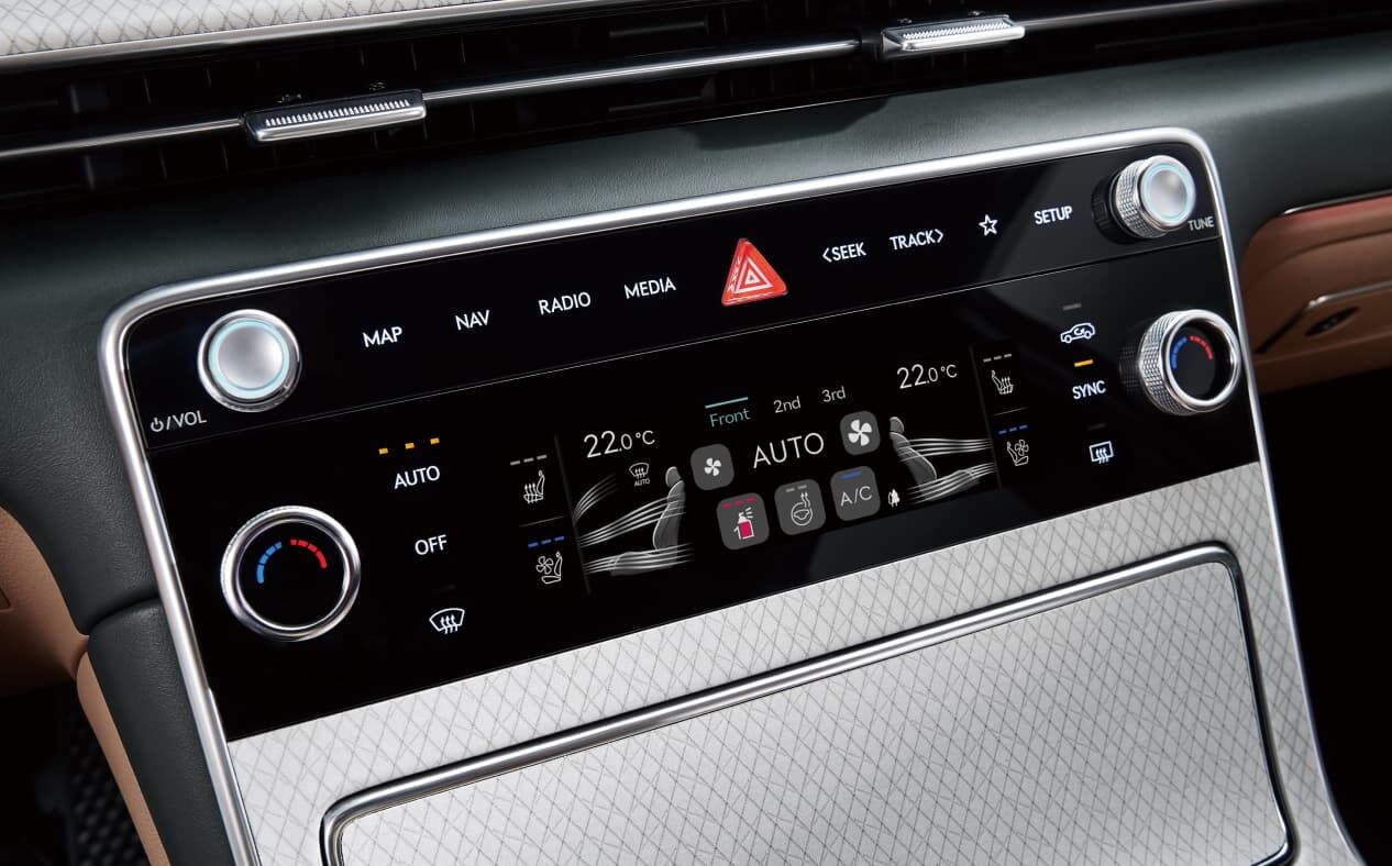 Le panneau de commande de la climatisation à l'intérieur du GV80 Coupé.