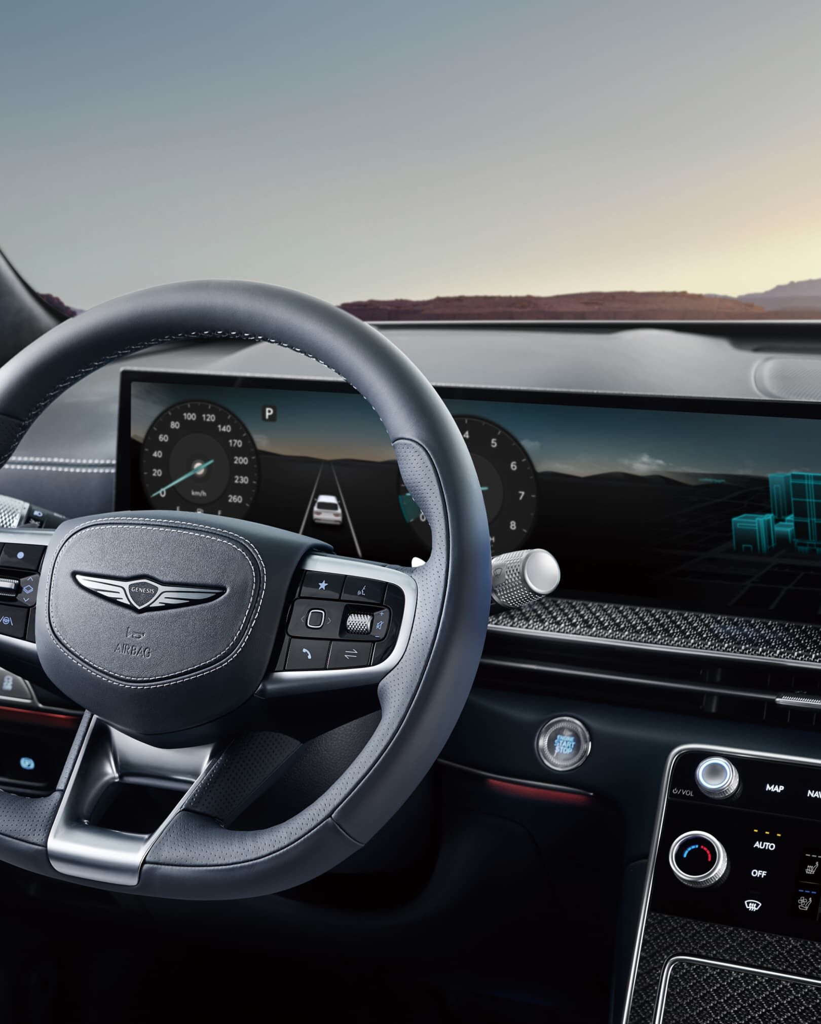 L'écran de 27 pouces à l'intérieur du GV80 Coupé, avec vue sur la route à travers la glace.