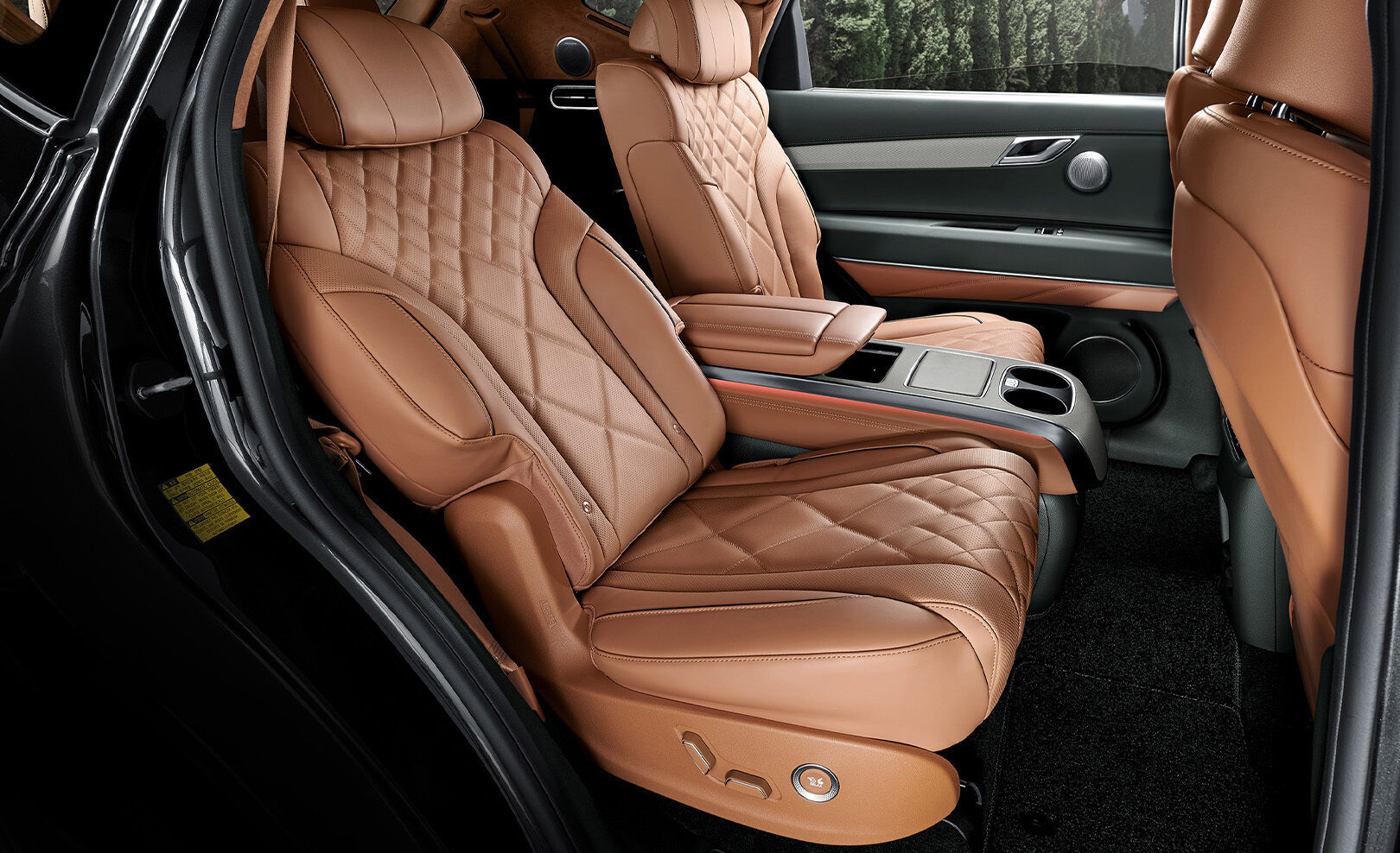  The back seats are seen through the center of the front seats.