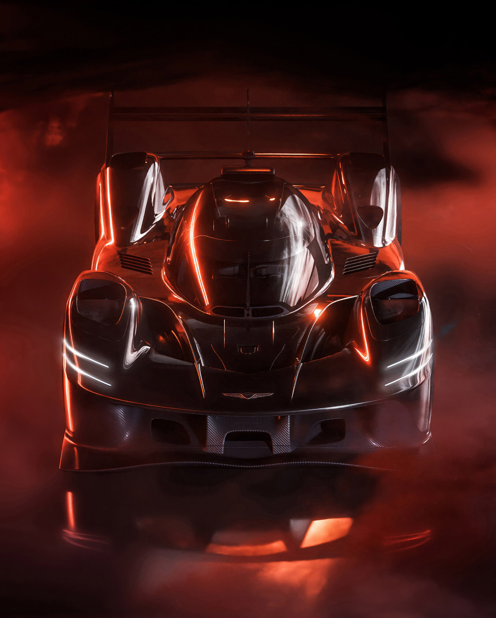 A top-down view of the black GMR-001 hypercar, with fog in the background.