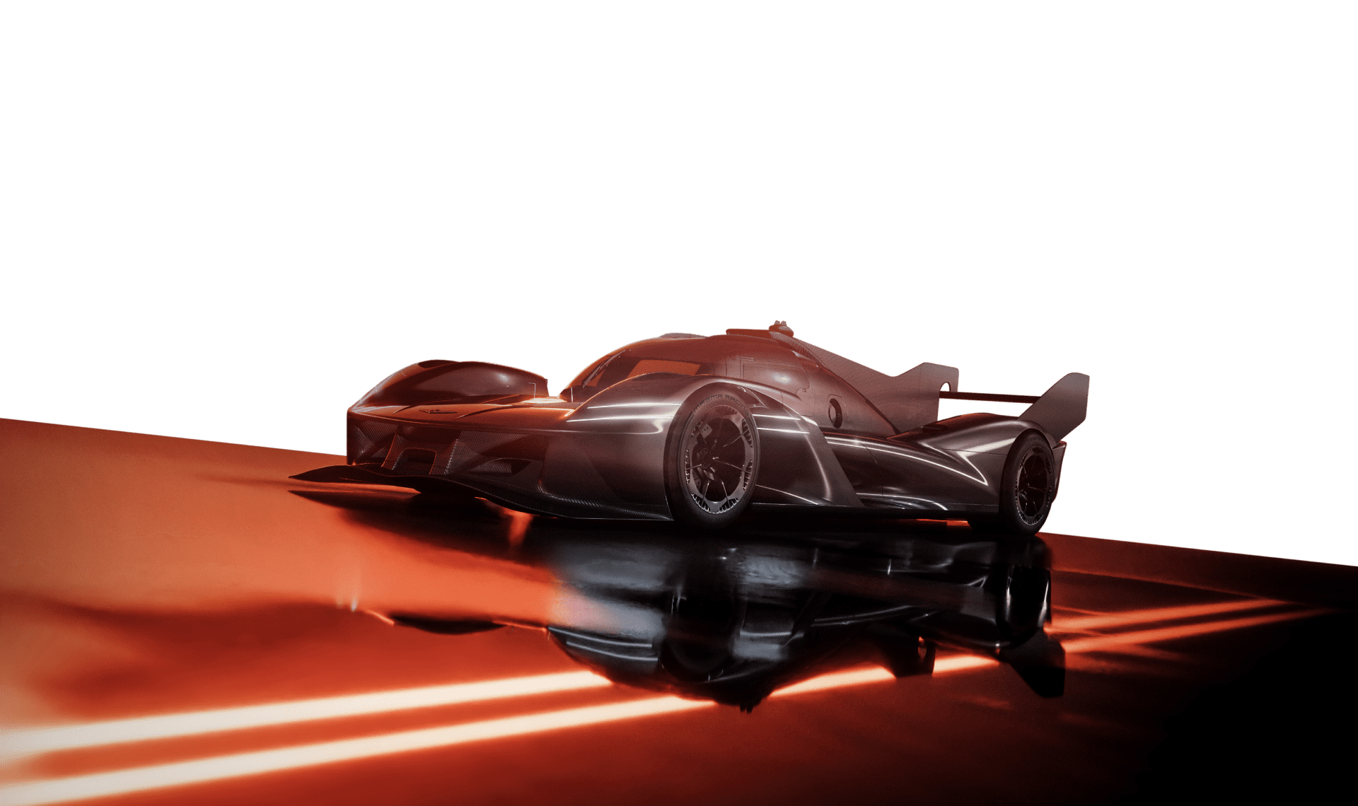 The magma-colored GMR-001 hypercar stands with its front end visible on the road against a black background.