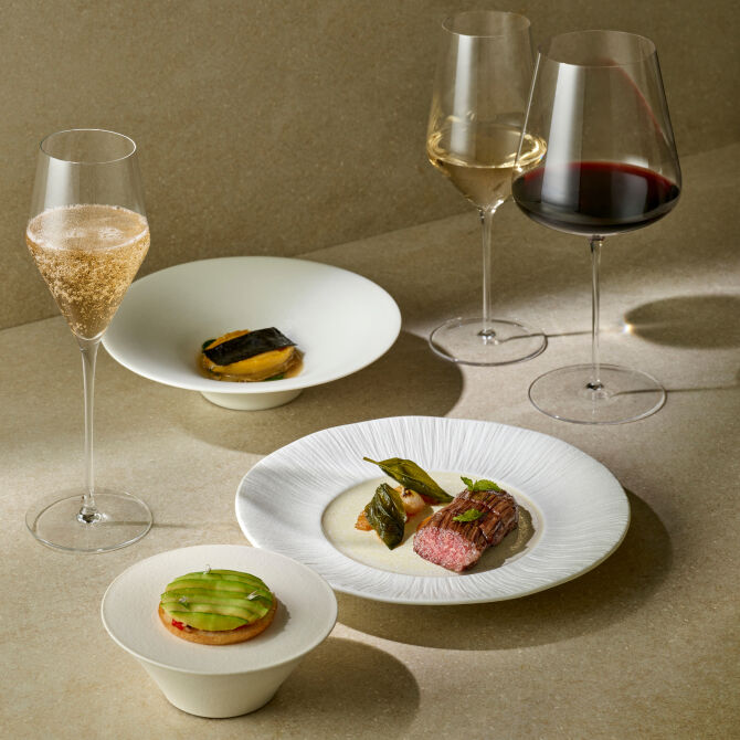Champagne, white wine, red wine, and a tart with a steak green topping