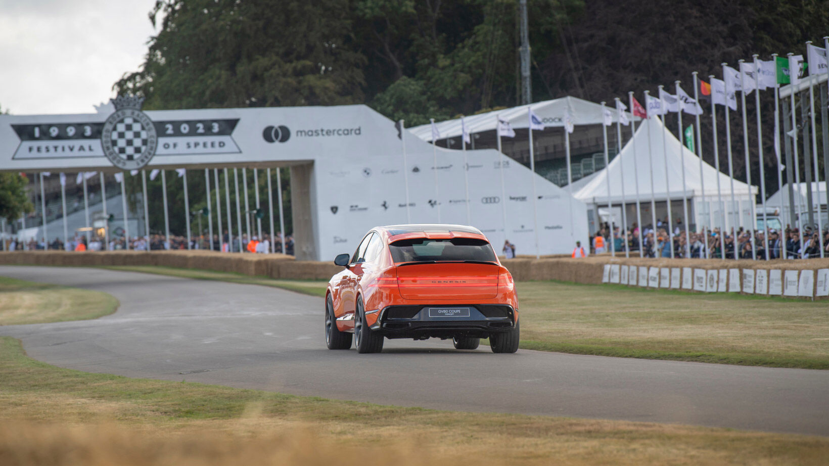 A banner printed with the Goodwood Festival of Speed logo is displayed.
