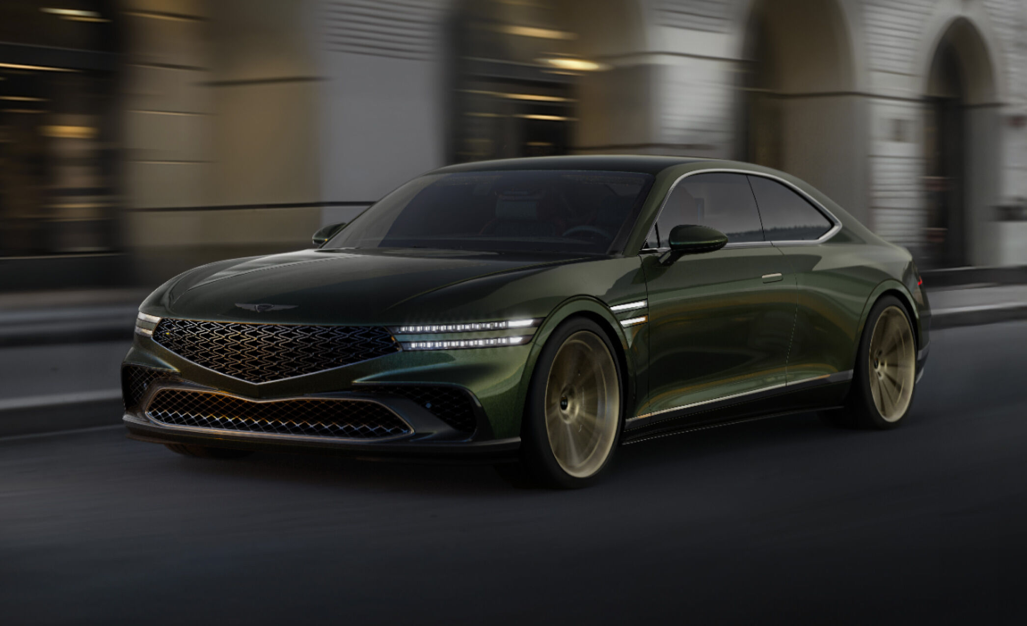 A Genesis X Gran Coupe is driving with a modern city in the background.