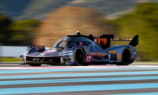 GMR-001 hypercar racing on a circuit