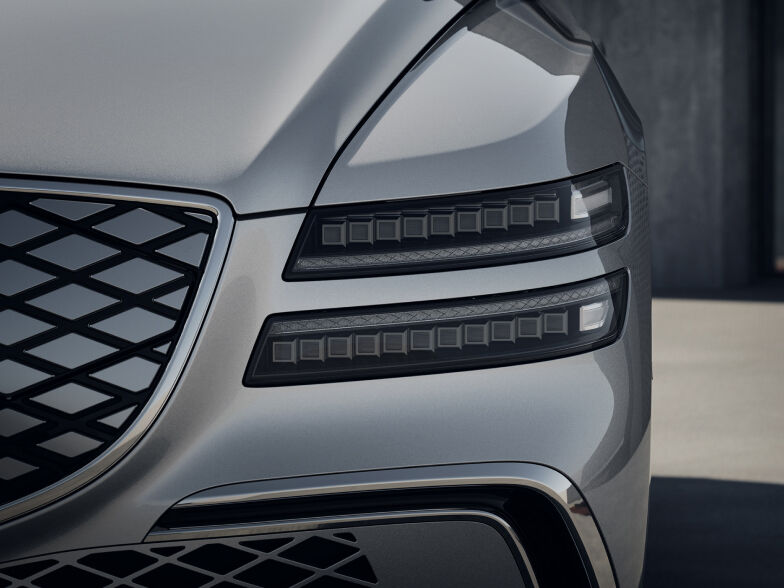 A zoomed-in view of the front headlamps of the Electrified G80. 