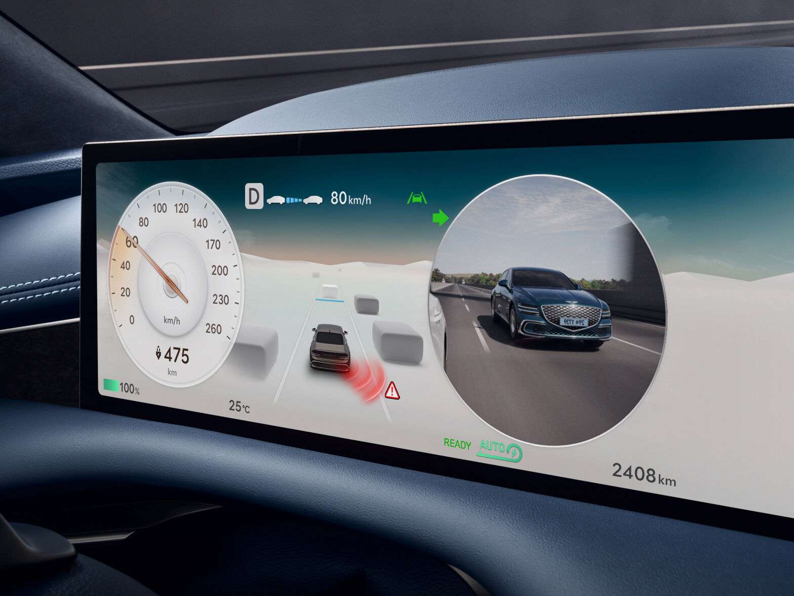 The display in front of the driver's seat shows dashboard graphics, a view of the vehicle from the outside, and a view of the vehicle from behind driving on the road.