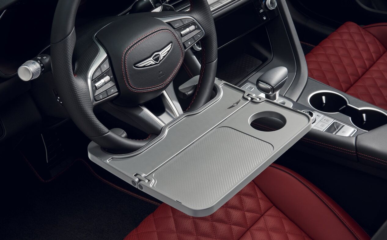 The steering wheel table attached to the bottom of the steering wheel.