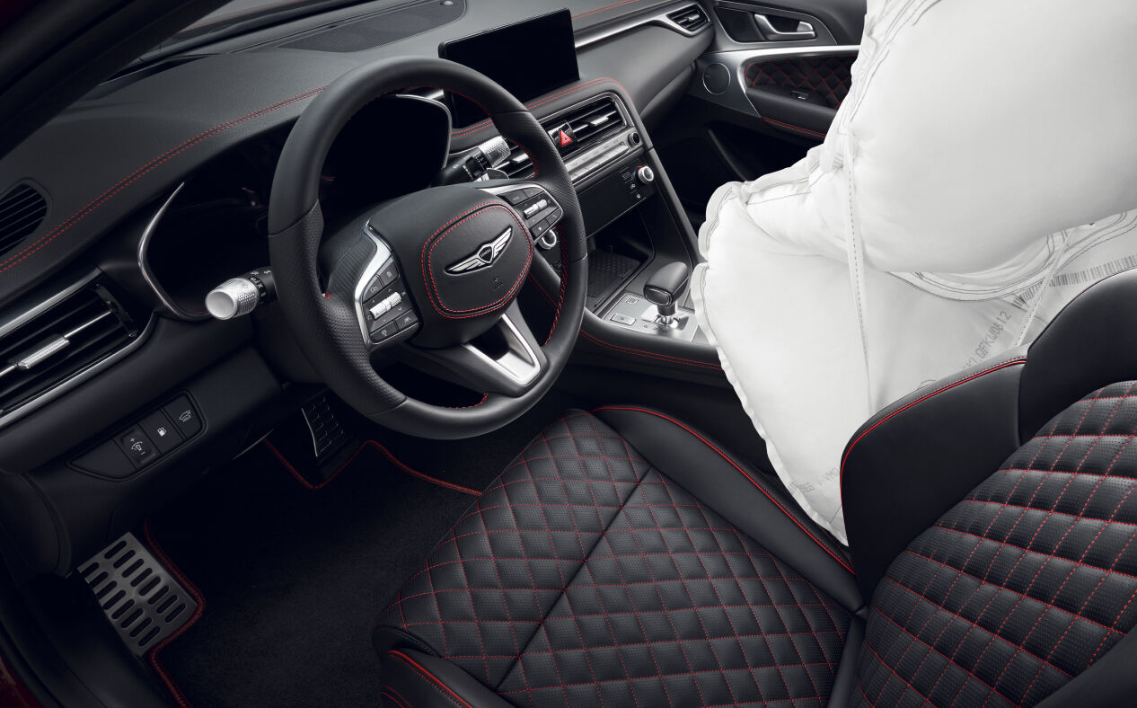 An airbag seen next to the driver's seat.