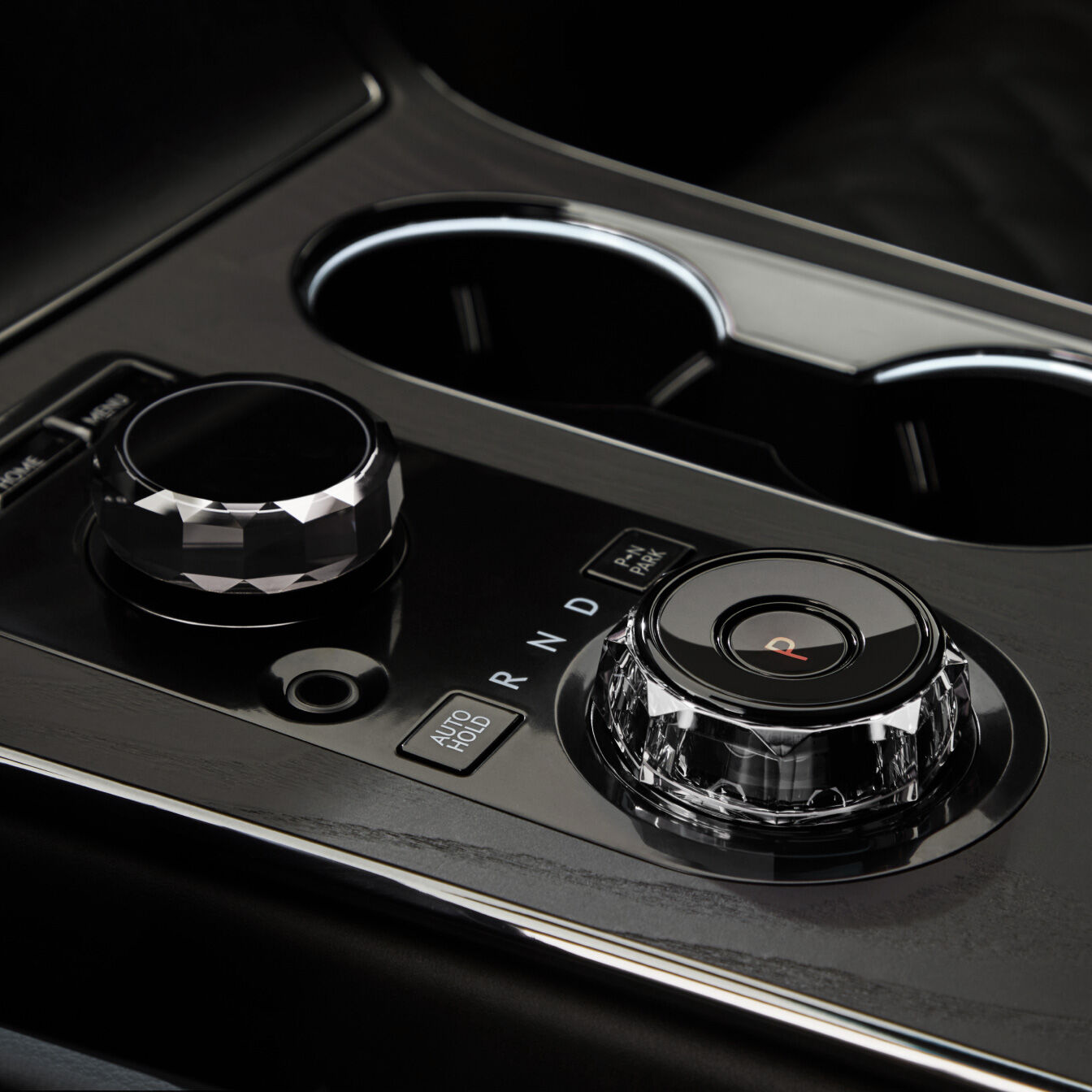 The red 'P' marked electronic shift dial and various switches are shown.
