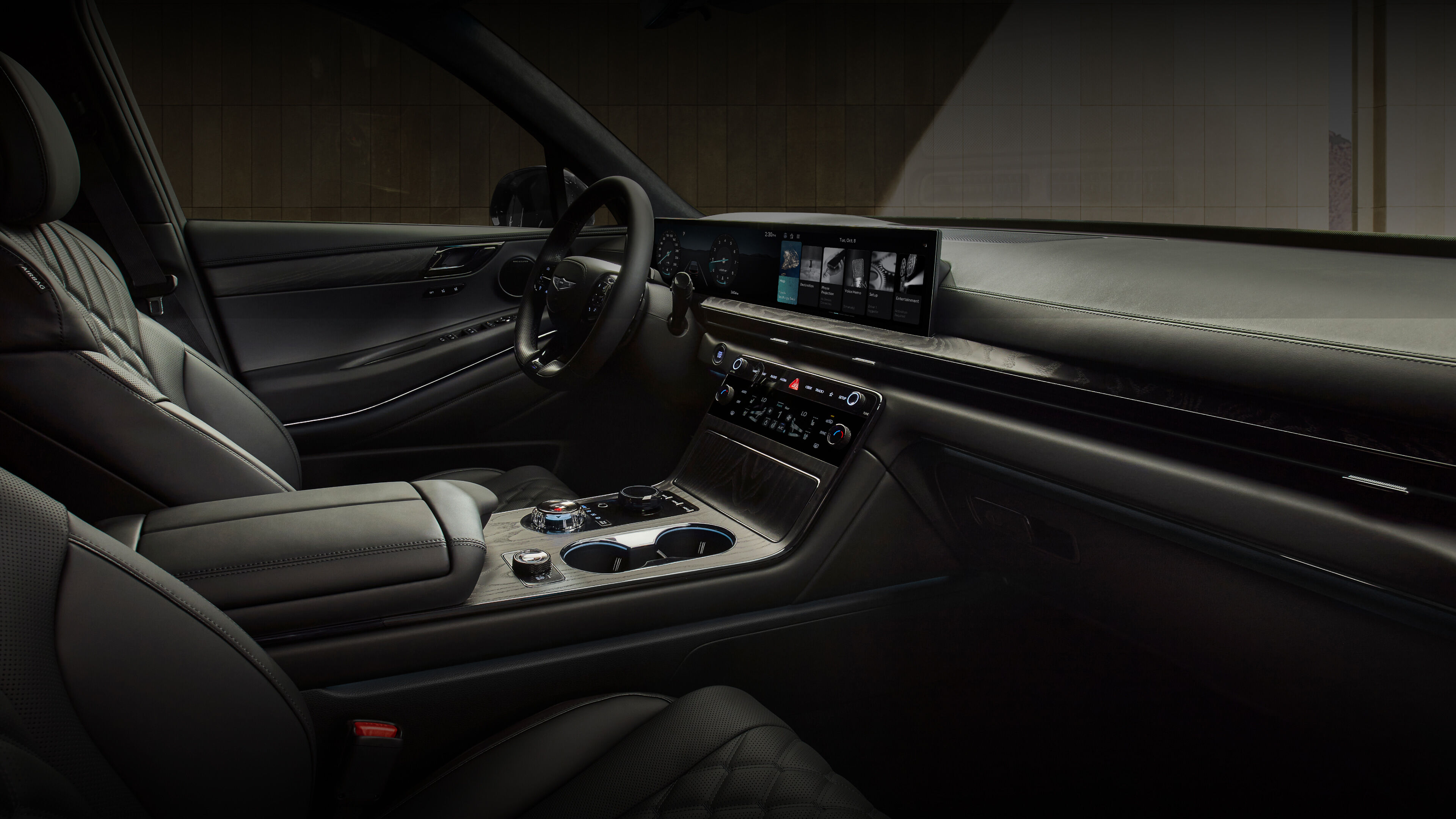 From the passenger seat, the interior design of the GV80 Coupe Black is visible.