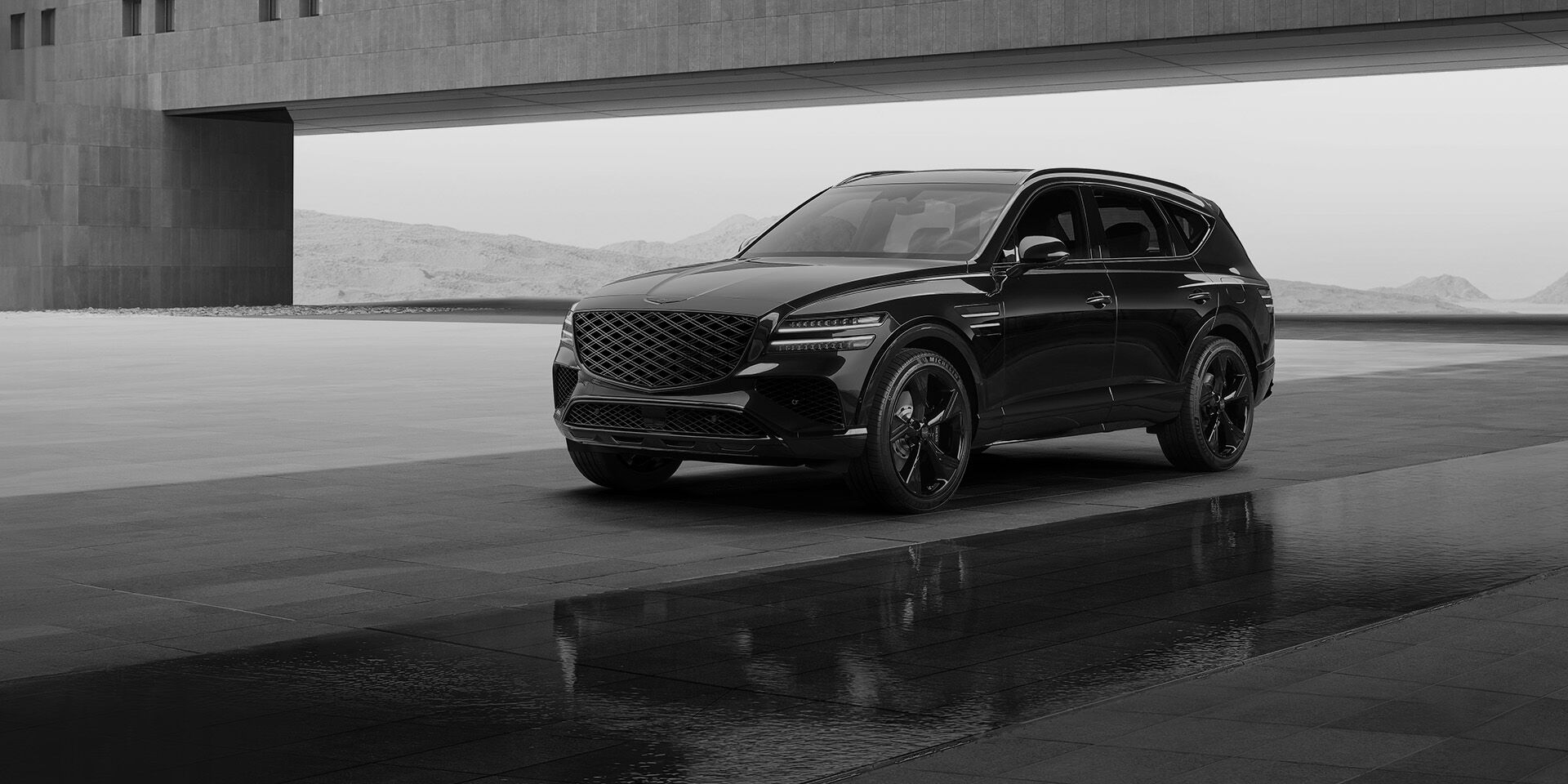 This is the front side view of the Genesis GV80 Black vehicle.