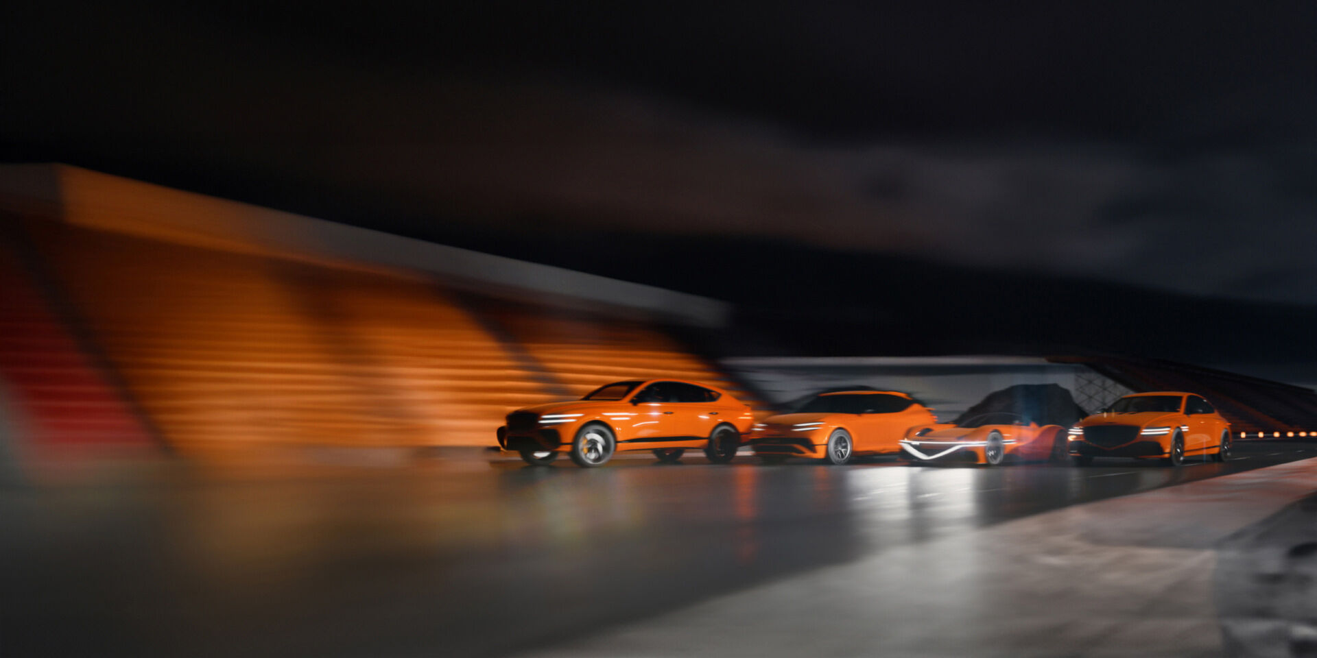 Four orange magma vehicles are racing against a backdrop of orange stands in the dark night.