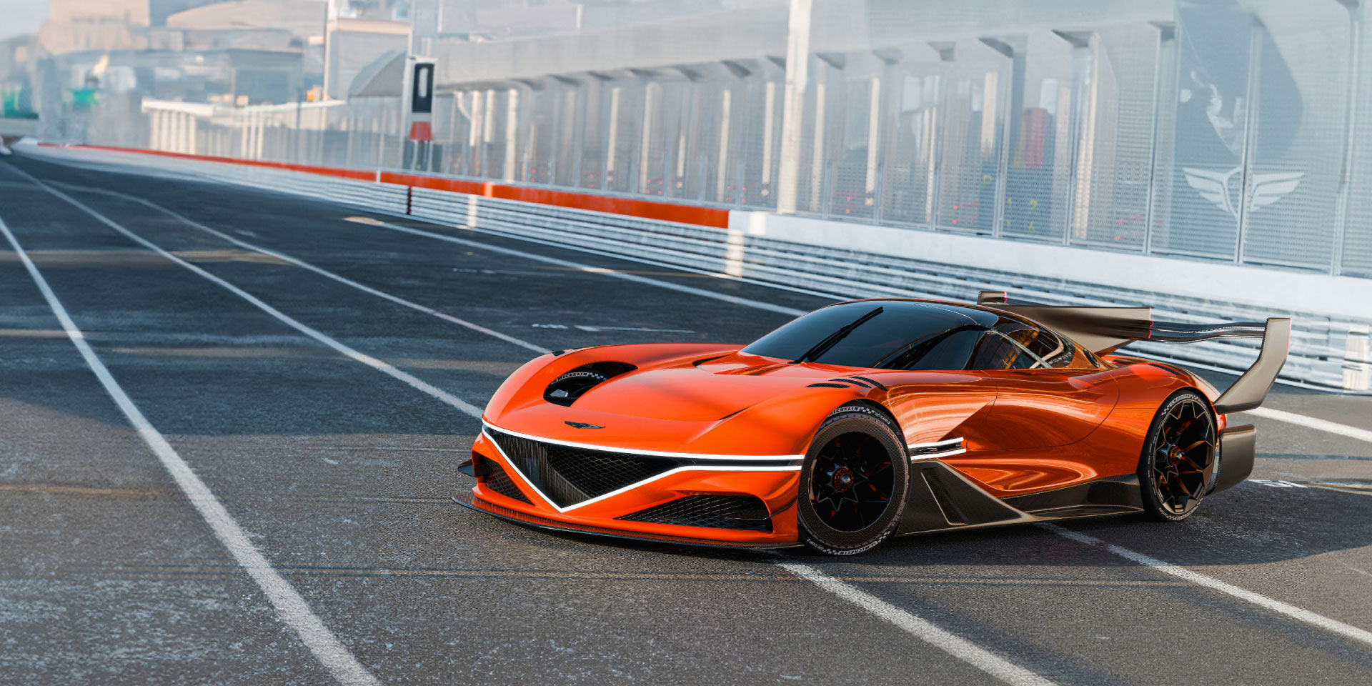 A magma orange colored Genesis X Gran Racer Concept is parked on a race track.