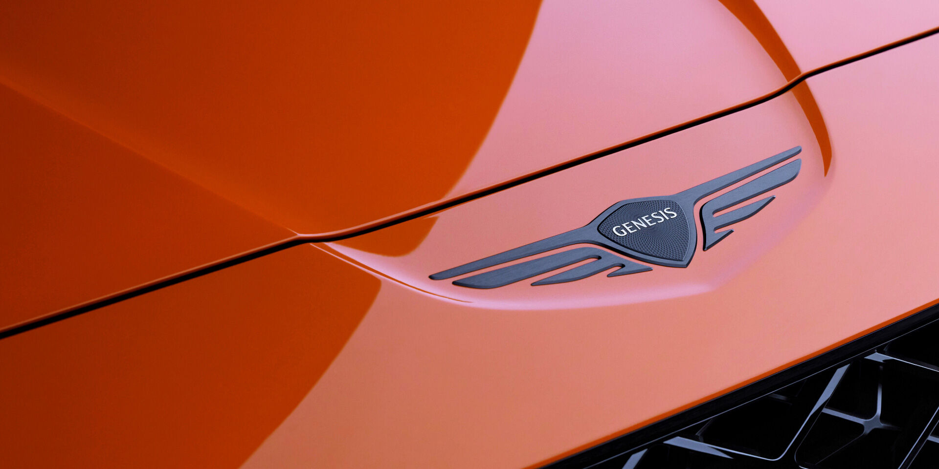 The black Genesis logo subtly appears on the front of the Magma vehicle.
