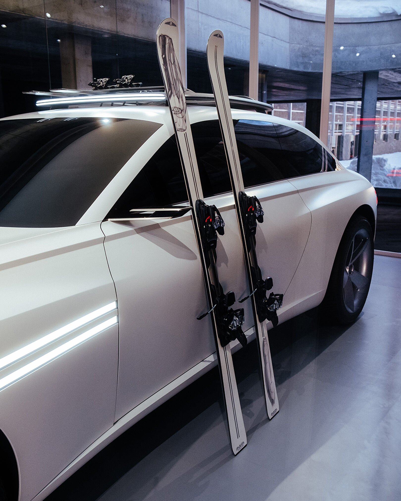  Ski equipment is set up on the side of the white-colored Genesis X Snow Speedium concept.
