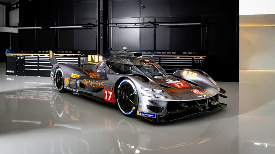 GMR-001 hypercar parked in a garage, front three-quarter view
