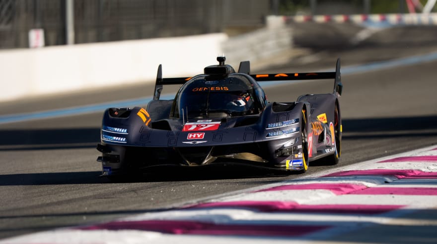 GMR-001 hypercar driving slowly on a circuit
