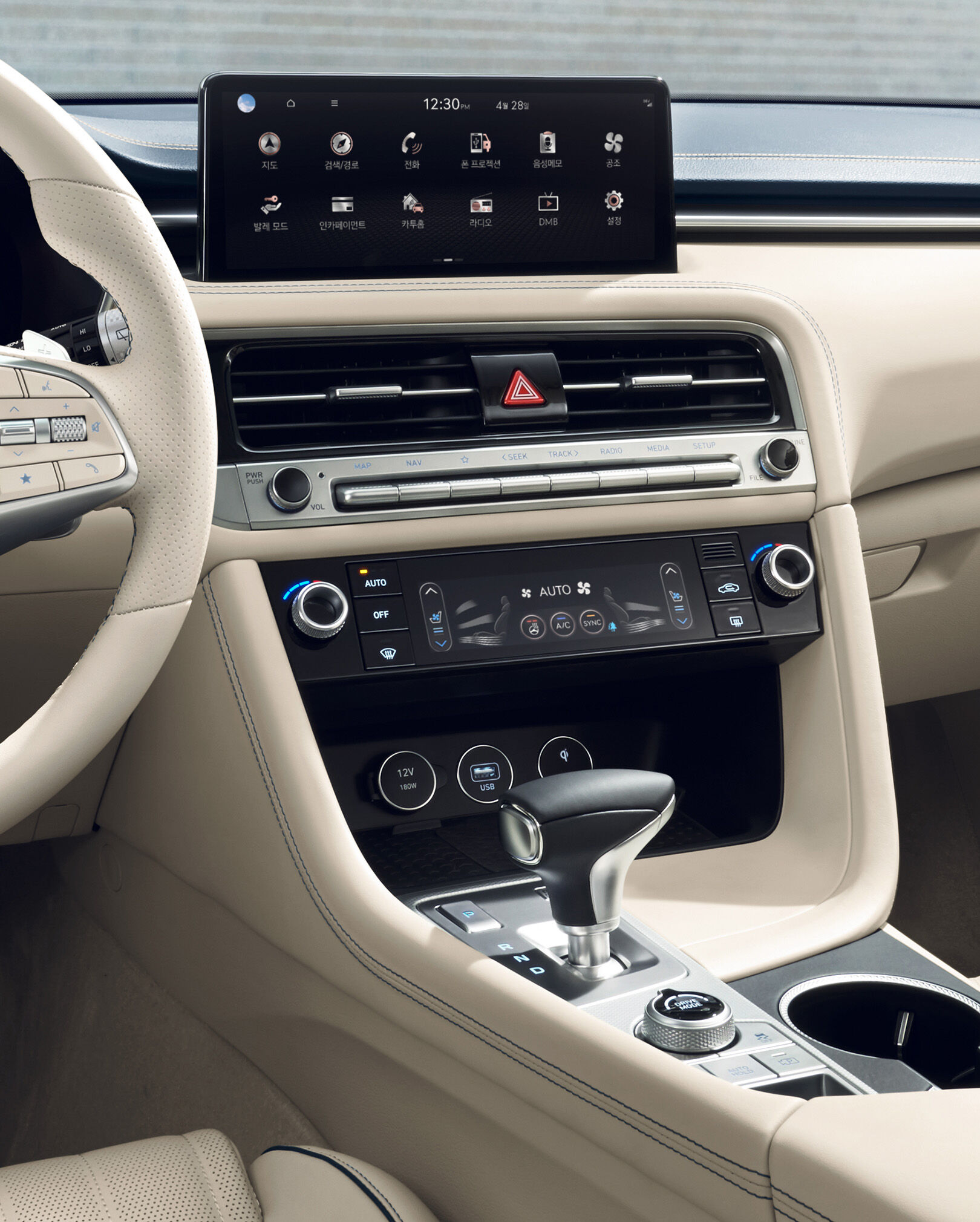 The infotainment system and air conditioning panel, seen from the driver's perspective.