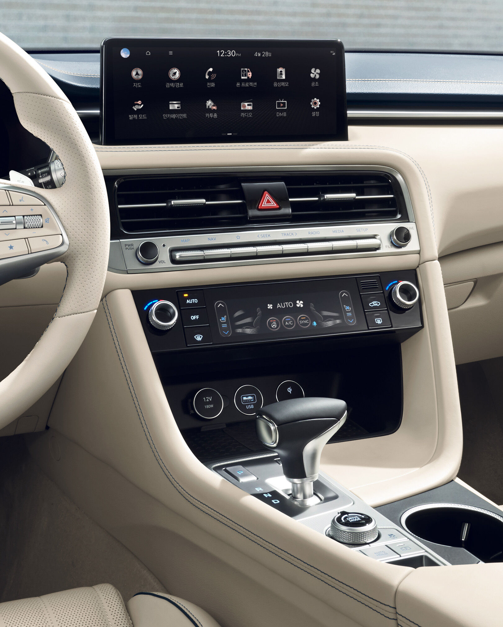 The infotainment system and air conditioning panel, seen from the driver's side.