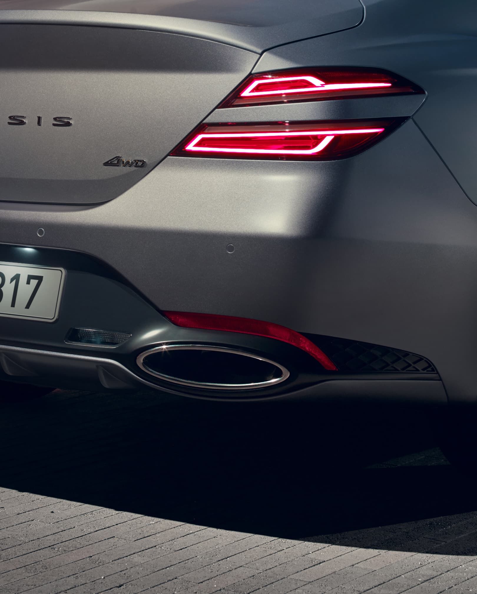 The rear muffler on G70 Makalu Gray.