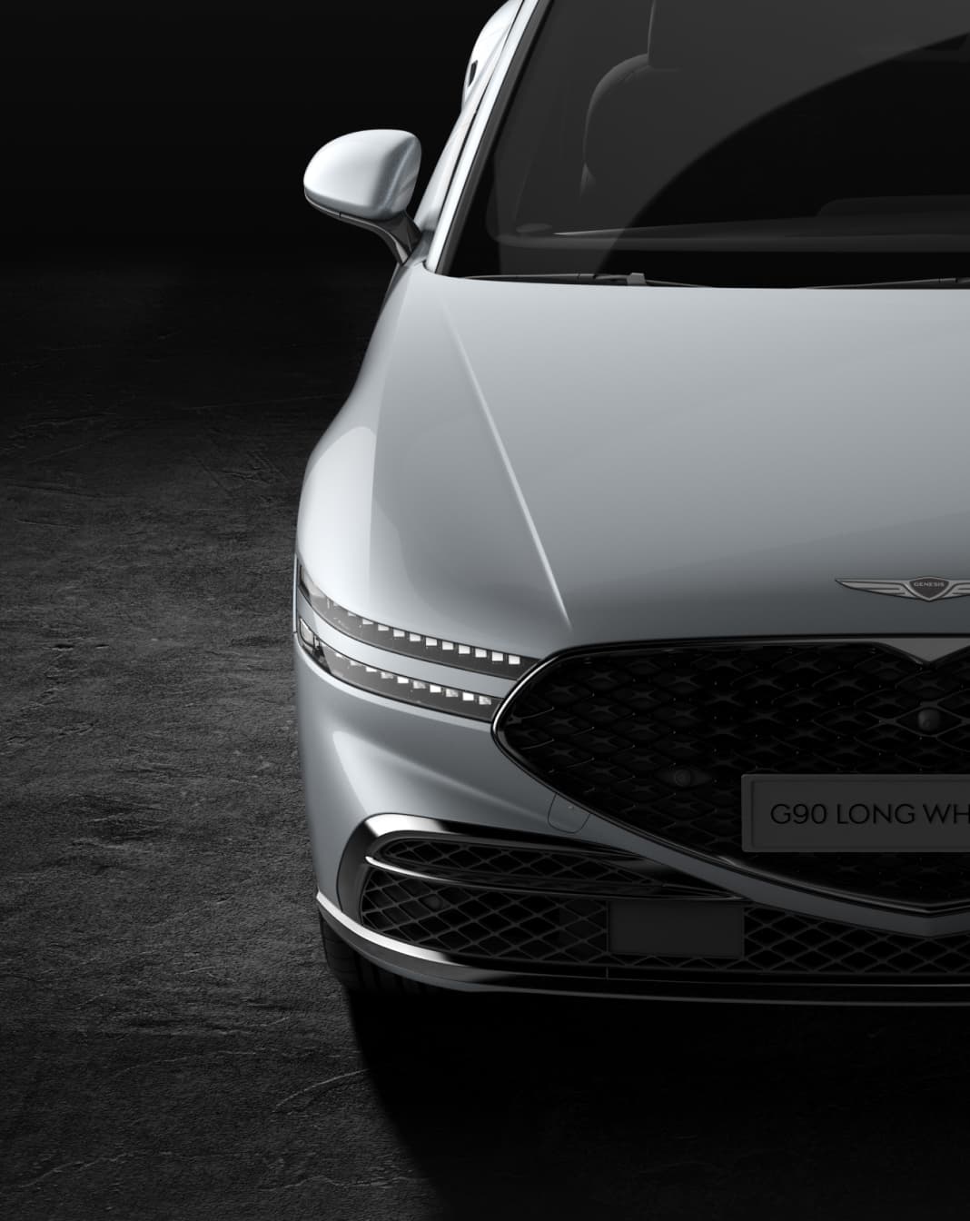 The front passenger side of G90 Long Wheel Base in Savile Silver.